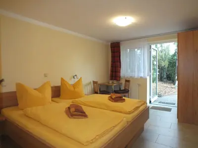 Ein Bett oder Betten in einem Zimmer der Unterkunft Ferienobjekt beim Steinmetzen