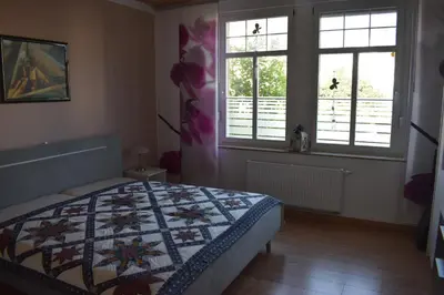 Ein Bett oder Betten in einem Zimmer der Unterkunft FeWo Schmetterling