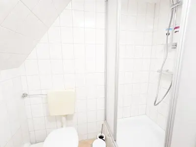 Ein Badezimmer in der Unterkunft B7 - Urlaubsmagie Maisonette Wohnung mit Balkon