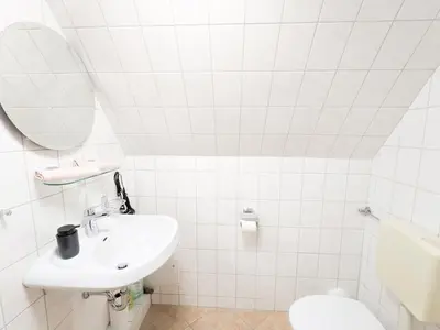 Ein Badezimmer in der Unterkunft B7 - Urlaubsmagie Maisonette Wohnung mit Balkon