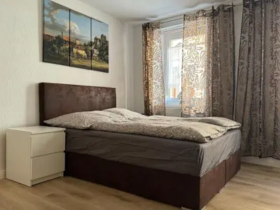 Ein Bett oder Betten in einem Zimmer der Unterkunft Sweet Home Inside Pirna one