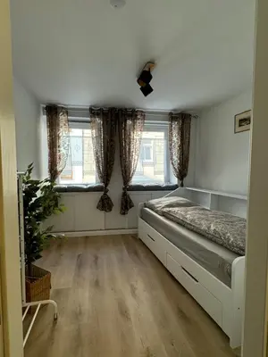 Ein Bett oder Betten in einem Zimmer der Unterkunft Sweet Home Inside Pirna one