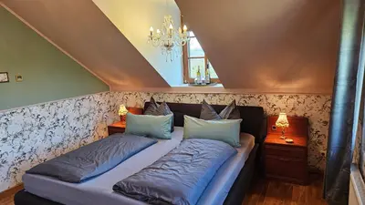 Ein Bett oder Betten in einem Zimmer der Unterkunft Villa Elbling