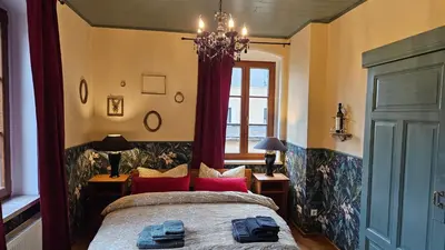 Ein Bett oder Betten in einem Zimmer der Unterkunft Villa Elbling