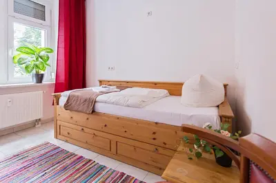 Ein Bett oder Betten in einem Zimmer der Unterkunft Gästezimmer IV Einzelzimmer in Unterkunft mit Gemeinschaftsbad und Gemeinschaftsküche Chemnitz