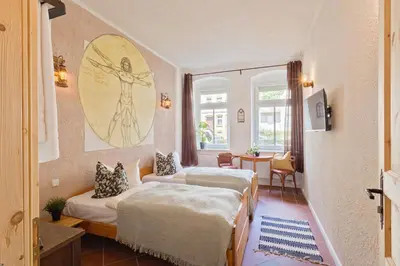 Ein Bett oder Betten in einem Zimmer der Unterkunft Doppelzimmer II Gästezimmer in Unterkunft mit Gemeinschaftsbad und Gemeinschaftsküche Chemnitz