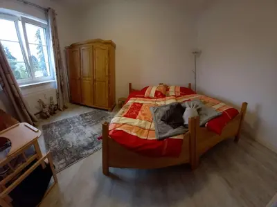 Ein Bett oder Betten in einem Zimmer der Unterkunft Ferienwohnung Finkenberg