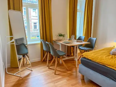 Ein Sitzbereich in der Unterkunft Pirna City Apartment 4 PERSONEN, WLAN, BALKON