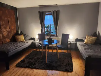 Ein Sitzbereich in der Unterkunft Schwalbenhof