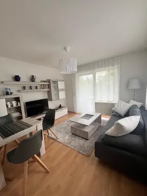 Ein Sitzbereich in der Unterkunft Kleine moderne Ferienwohnung