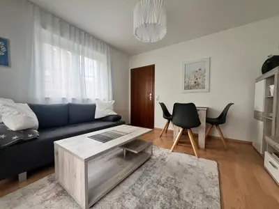 Ein Sitzbereich in der Unterkunft Kleine moderne Ferienwohnung