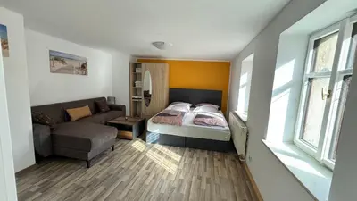 Ein Bett oder Betten in einem Zimmer der Unterkunft Pension Arthur 22