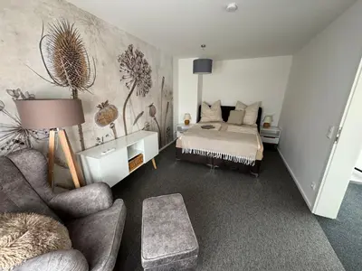 Ein Bett oder Betten in einem Zimmer der Unterkunft Gästehaus Auszeit