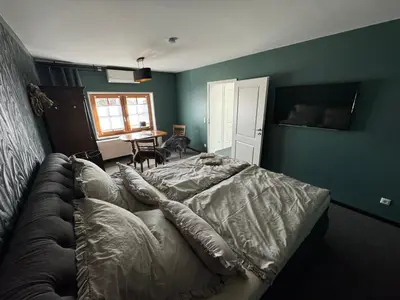 Ein Bett oder Betten in einem Zimmer der Unterkunft Gästehaus Auszeit