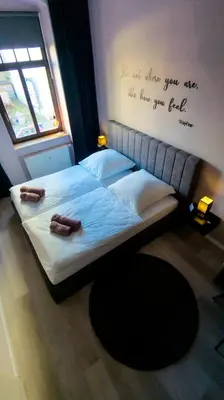 Ein Bett oder Betten in einem Zimmer der Unterkunft StayFine - smartes Design Apartment am Uni Campus