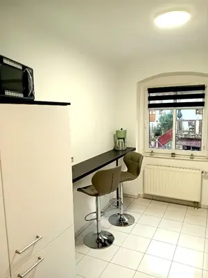 Küche/Küchenzeile in der Unterkunft Seyfarthrooms - Ferienwohnung Zum Dorfladen Rathen - zentrale Lage mit direkter Anbindung an das Wanderwegenetz, moderne Inneneinrichtung