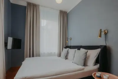 Ein Bett oder Betten in einem Zimmer der Unterkunft Zentrumsnah, Balkon, 2 Smart TV, schnelles WiFi