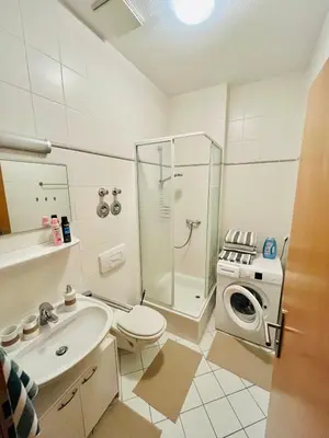 Ein Badezimmer in der Unterkunft Gemütliches Altbauapartment I