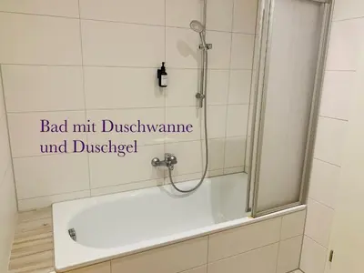 Ein Badezimmer in der Unterkunft Am Schloss Wolkenstein, 75m2, 2BR, Babybett