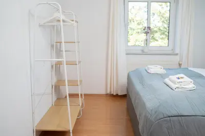 Ein Bett oder Betten in einem Zimmer der Unterkunft JINO Pirna I modern - Top Lage - Balkon
