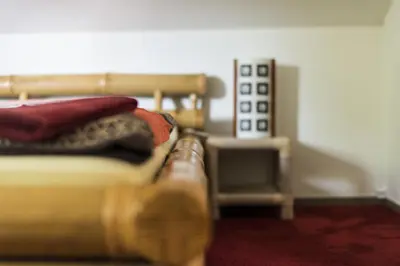 Ein Bett oder Betten in einem Zimmer der Unterkunft Ferienwohnung Casa Casimir mit Elbblick, Balkon und großen Garten