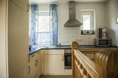 Küche/Küchenzeile in der Unterkunft Ferienwohnung Casa Casimir mit Elbblick, Balkon und großen Garten