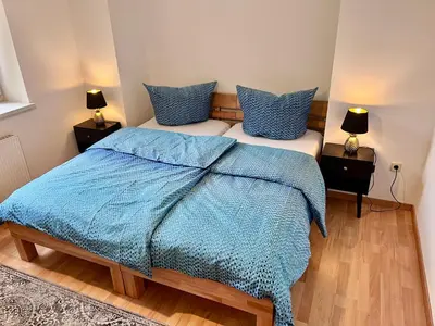 Ein Bett oder Betten in einem Zimmer der Unterkunft Apartment in Grimma mit 2 Schlafzimmer