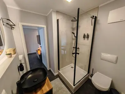 Ein Badezimmer in der Unterkunft Sunnybelle Appartements Freital I
