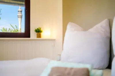 Ein Bett oder Betten in einem Zimmer der Unterkunft Ferienhaus am Fernsehturm