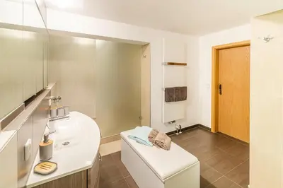 Ein Bett oder Betten in einem Zimmer der Unterkunft Ferienhaus am Fernsehturm