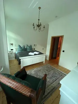 Ein Bett oder Betten in einem Zimmer der Unterkunft Villa Märchenland