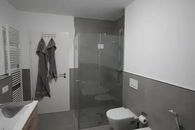 Ein Badezimmer in der Unterkunft KoschenOase Wohnung barreriefrei 4 Personen