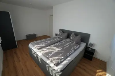 Ein Bett oder Betten in einem Zimmer der Unterkunft KoschenOase Wohnung barreriefrei 4 Personen