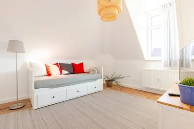 Ein Bett oder Betten in einem Zimmer der Unterkunft Moderne Gemütliche Wohnung
