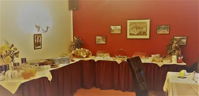 Ein Restaurant oder anderes Speiselokal in der Unterkunft Landpension Bielatal - Raum
