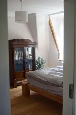 Ein Bett oder Betten in einem Zimmer der Unterkunft Zentrumsnahe Ferienwohnung 