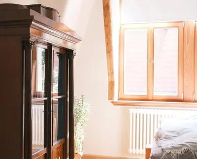 Ein Bett oder Betten in einem Zimmer der Unterkunft Zentrumsnahe Ferienwohnung 