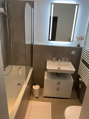 Ein Badezimmer in der Unterkunft Modernes City-Apartment mit großer Terrasse