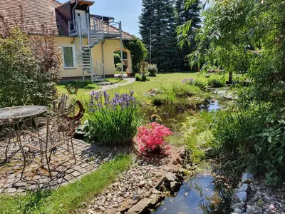 Ein Garten an der Unterkunft Gästehaus am schmalen See UG haftungsbeschränkt
