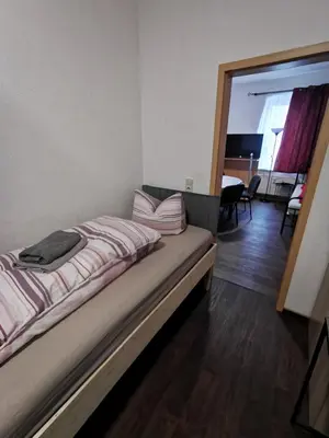 Ein Bett oder Betten in einem Zimmer der Unterkunft SaxonyBNB