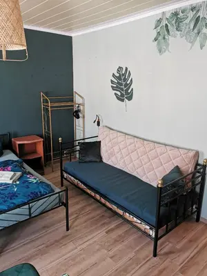 Ein Bett oder Betten in einem Zimmer der Unterkunft SaxonyBNB