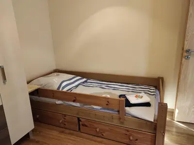Ein Bett oder Betten in einem Zimmer der Unterkunft Quartier Torno