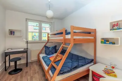 Ein Bett oder Betten in einem Zimmer der Unterkunft QuartierDresden zentral-elbnah-ruhig-familienfeundlich-ÖPNV