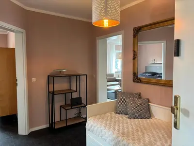 Ein Bett oder Betten in einem Zimmer der Unterkunft Apartment im Elbtal Meißen-Dresden