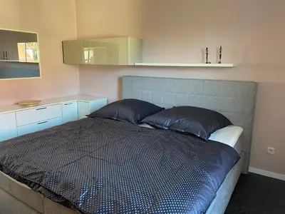 Ein Bett oder Betten in einem Zimmer der Unterkunft Apartment im Elbtal Meißen-Dresden