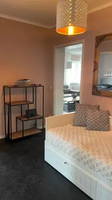 Ein Bett oder Betten in einem Zimmer der Unterkunft Apartment im Elbtal Meißen-Dresden