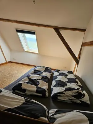 Ein Bett oder Betten in einem Zimmer der Unterkunft Unterkunft , Ferienwohnung auf dem Land, Monteurswohnung