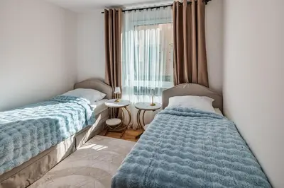 Ein Bett oder Betten in einem Zimmer der Unterkunft Apartment am Großen Garten - Terrasse & Parkplatz -8 Personen