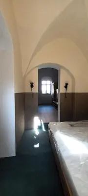 Ein Bett oder Betten in einem Zimmer der Unterkunft Roßweiner Hof