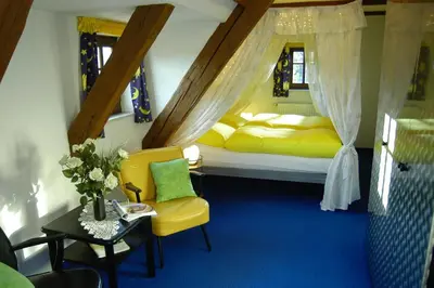 Ein Bett oder Betten in einem Zimmer der Unterkunft Landhaus Sorgenfrei